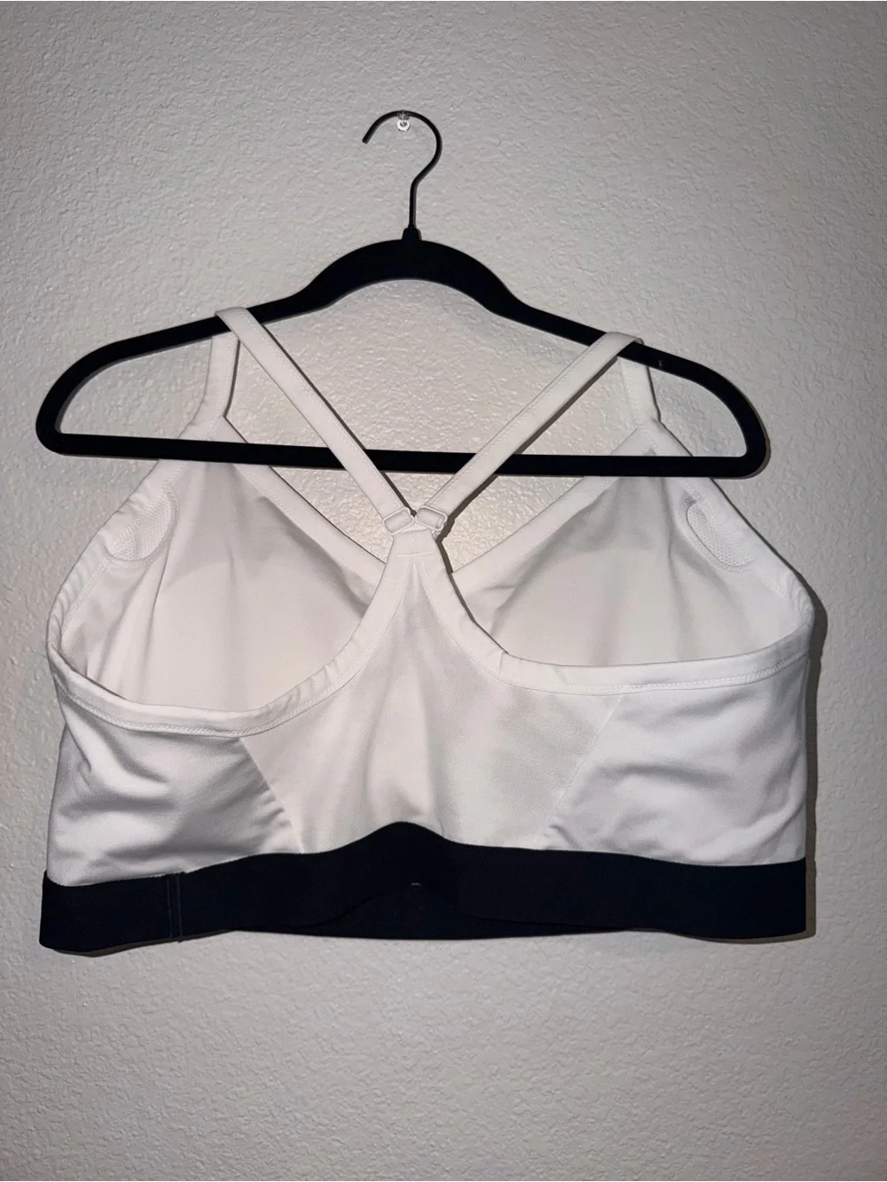 Nike Indy Women's Light-Support Padded V-Neck Sports Bra.